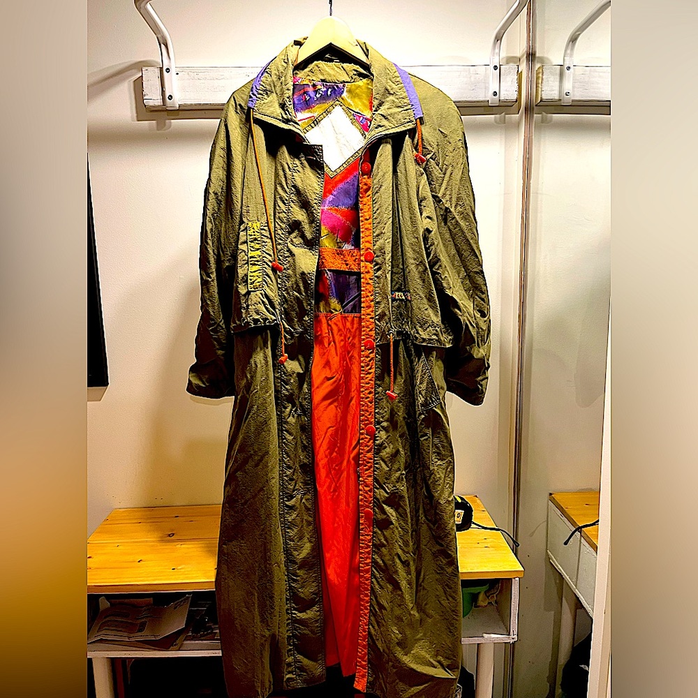 Vintage 90s long rain jacket; tags are faded, measurements indicate women’s med